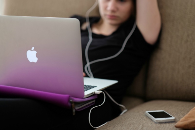 teenage girl on computer